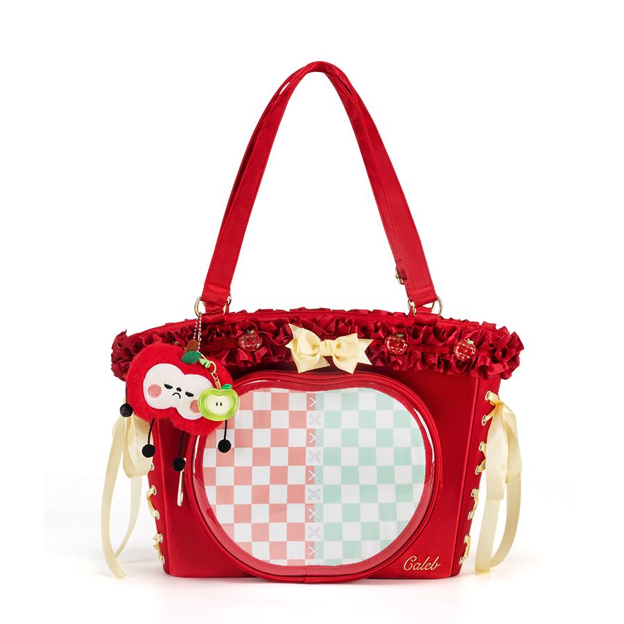 A customizable ita bag with a clear front panel, allowing for unique pin and charm displays, emphasizing personalized design.